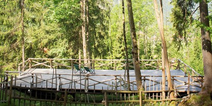 Naturhotel - Spa-Bereich mit mind. 2 unterschiedlichen Saunen - Oberbayern - Sonnendeck und Yoga Plattform. Waldbaden inklusive.  - Tannerhof Naturhotel & Gesundheitsresort