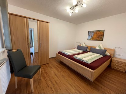 Naturhotel - Umgebungsschwerpunkt: Land - Uelzen - Schlafzimmer Natur-Suite im Neues Landhaus im Bio-Hotel TraumzeitHof - Bio-Hotel TraumzeitHof - Naturotel 
