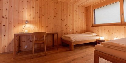 Naturhotel - Bio-Hotel Merkmale: Elektrosmog-reduziert - Bern - ChieneHuus - das Holz100-Retreathaus im Kiental - ChieneHuus