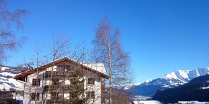 Naturhotel - Familienzimmer - Schweiz - Winterlandschaft des Biohotels - Biohotel Ucliva