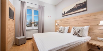 Naturhotel - Bio-Küche: Glutenfreie Kost möglich - Region Kitzbühel - Doppelzimmer der S-Kategorie mit kleinem Schlafbereich - Q! Resort Health & Spa Kitzbühel