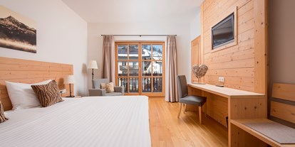 Naturhotel - Wellness - Tirol - Doppelzimmer der M-Kategorie im historischen Stammhaus - Q! Resort Health & Spa Kitzbühel