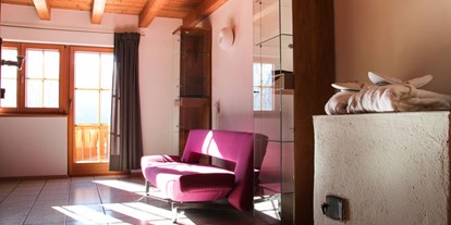Naturhotel - Wellness - Tirol - Gästezimmer Morgensonne mit Lehmputzwänden - Veganer Gasthof zum Ederplan