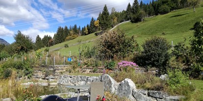 Naturhotel - Energieversorgung: 100 % Ökostrom - Osttirol - Naturgarten mit Teich - Veganer Gasthof zum Ederplan