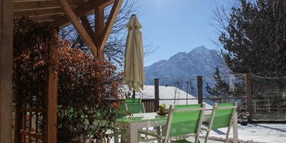 Naturhotel - Bio-Küche: Rohkost möglich - Osttirol - Sonnenterrasse im Winter - Veganer Gasthof zum Ederplan