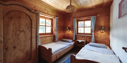 Naturhotel - Regionale Produkte - Obertraun - Schlafzimmer Sonnenwohnung im Waldhaus - Naturhaus Lehnwieser