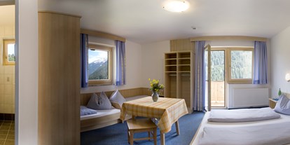 Naturhotel - Sonnenterrasse - Hinterglemm - Familienkomfortzimmer - Bio-Pension Vorderlengau