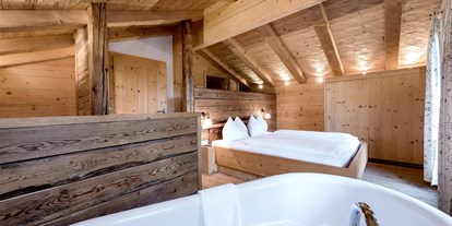 Naturhotel - Bio-Hotel Merkmale: Naturbadeteich - Going am Wilden Kaiser - Honeymoon Chalet - Naturresort PURADIES