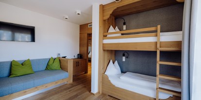 Naturhotel - Wanderungen & Ausflüge - Leogang - Premium-Suite Schlafzimmer - Naturresort PURADIES