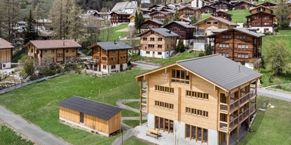 Naturhotel - Wasserbehandlung/ Energetisierung: Verwirbeltes Wasser - Aussenansicht Berglodge Goms - Berglodge Goms