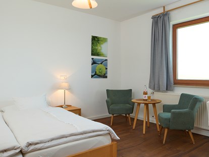 Naturhotel - Bio-Hotel Merkmale: Naturgarten - Hackenheim - Klassik-Zimmer mit baubiologischer Ausstattung - BioWeingut & Landhotel Gänz