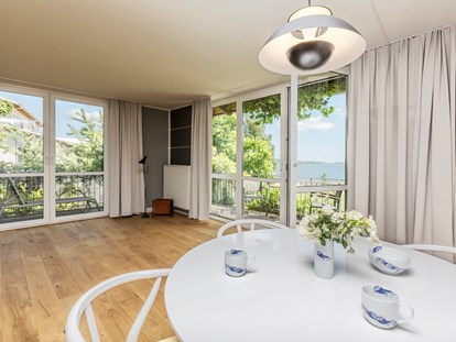 Naturhotel - Energieversorgung: 100 % Ökostrom - Rügen - Land-Appartements
Viele unserer Appartements bieten einen schönen Ausblick auf die Bucht. - im-jaich Wasserferienwelt