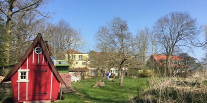 Naturhotel - Seminare & Schulungen - Wangerland - Mit großem Garten und Zeltwiese  - Yoga Vidya Nordsee