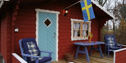Naturhotel - Wassersparmaßnahmen - Vimmerby - Neben Ferienhütten kann man hier auch Camping machen. - Lilla Sverigebyn