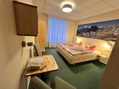 Naturhotel - Bezahlsysteme: PayPal - Schweriner See - Bio Hotel Amadeus: Komfortzimmer Salzburg Hofseite - Biohotel Amadeus