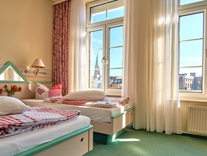 Naturhotel - Mitarbeiterbetreuung: Überdurchschnittliche Bezahlung - BIO HOTEL Amadeus: Doppelzimmer Hofseite - Biohotel Amadeus