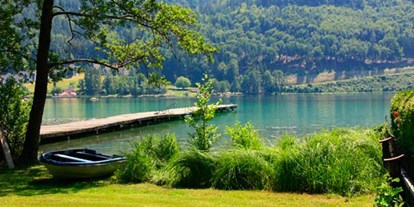 Naturhotel - Bio-Anteil: mind. 80% Bio - Klopeiner See - Privatstrand, Badestrand mit Liegewiese an einem der wärmsten Badeseen Europas, dem Klopeiner See - Loving Hut am Klopeiner See