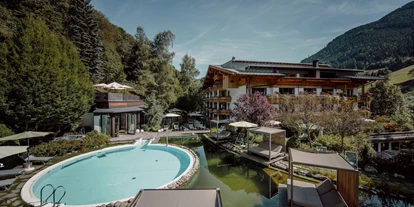 Naturhotel - Bonus bei Verzicht der Zimmerzwischenreinigung - Hundsdorf (Bruck an der Großglocknerstraße) - Pools in Schwimmteich im Garten - Gartenhotel Theresia****S