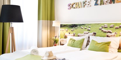 Nature hotel - barrierefrei: Öffentliche Bereiche barrierefrei - Austria - Familienzimmer - Boutiquehotel Stadthalle