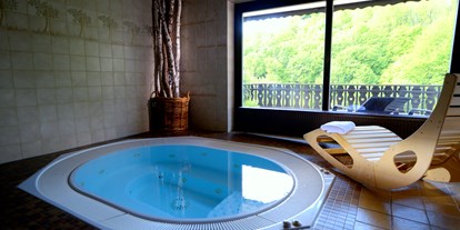 Naturhotel - Umgebungsschwerpunkt: Land - PLZ 34376 (Deutschland) - Entspannen im Whirlpool - BELVEDERE-das BIO Hotel garni & SuiteHotel am Ederseee