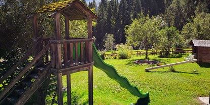 Naturhotel - Bio-Küche: Biologisches Angebot - Flumserberg Bergheim - Spielplatz des Öko-Hotels in Graubünden - Biohotel Ucliva