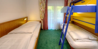 Nature hotel - Umgebungsschwerpunkt: Land - Heuberg (Lend) - Kinderzimmer mit Etagenbett - The RESI Apartments "mit Mehrwert"