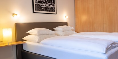 Nature hotel - Auszeichnung / Zertifikat / Partner: Bio Austria - Plankenau - Schlafzimmer - The RESI Apartments "mit Mehrwert"