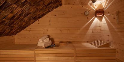 Naturhotel - Zertifizierte Naturkosmetik - PLZ 87629 (Deutschland) - Nach einem anstrengenden Tag in den Walser Bergen, lädt unsere Sauna zum Schwitzen und entspannen ein - Biohotel Walserstuba