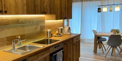 Naturhotel - Bio-Küche: Glutenfreie Kost möglich - Pyhrn Eisenwurzen - Apartment Dome - der baum