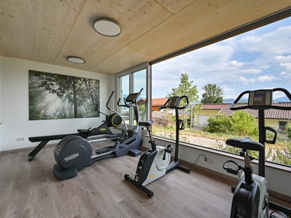 Nature hotel - Bio-Küche: Bio-Frühstück - Günzach - Hotel-Fitness-Studio für Sport und Workout mit Blick zu den Bergen - Biohotel Eggensberger
