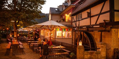 Naturhotel - Bio-Getränke - Sächsische Schweiz - Unser lauschige Biergarten lädt auch an lauen Sommerabenden zum Verweilen ein - Bio- & Nationalpark-Refugium Schmilka