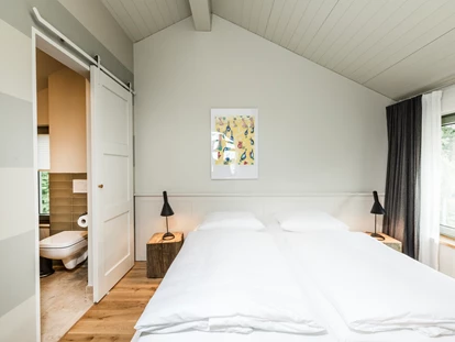 Naturhotel - Preisklasse: €€€ - Schulenberg - Schlafzimmer im Obergeschoss - im-jaich Naturoase Gustow