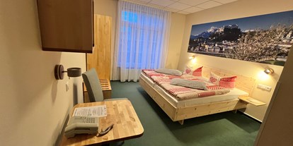 Naturhotel - Groß Stieten - Bio Hotel Amadeus: Komfortzimmer Salzburg Hofseite - Biohotel Amadeus
