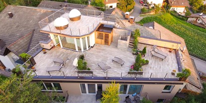 Nature hotel - Bioland-Partner: Gold - Ritten - Dachterrasse mit Sauna und Ruhezonen - Bio & Bikehotel Steineggerhof