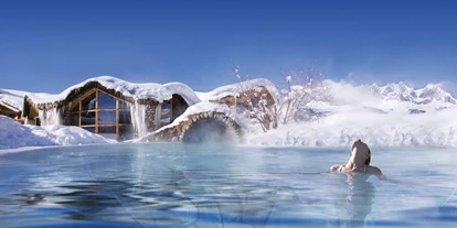 Nature hotel - Umgebungsschwerpunkt: Berg - Almen (Thiersee) - Beheizter Pool der Wasserwelten im Winter - Biohotel Stanglwirt