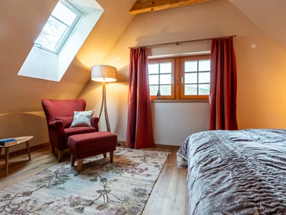 Naturhotel - Hoteltyp: Naturhotel - Sachsen - Die Leseecke im Doppelschlafzimmer der Kornblume. - BIO-NATURIDYLL WIESENGRUND