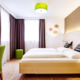 Biohotel: Doppelzimmer Superior Gartenhaus - Das Grüne Hotel zur Post - 100% BIO