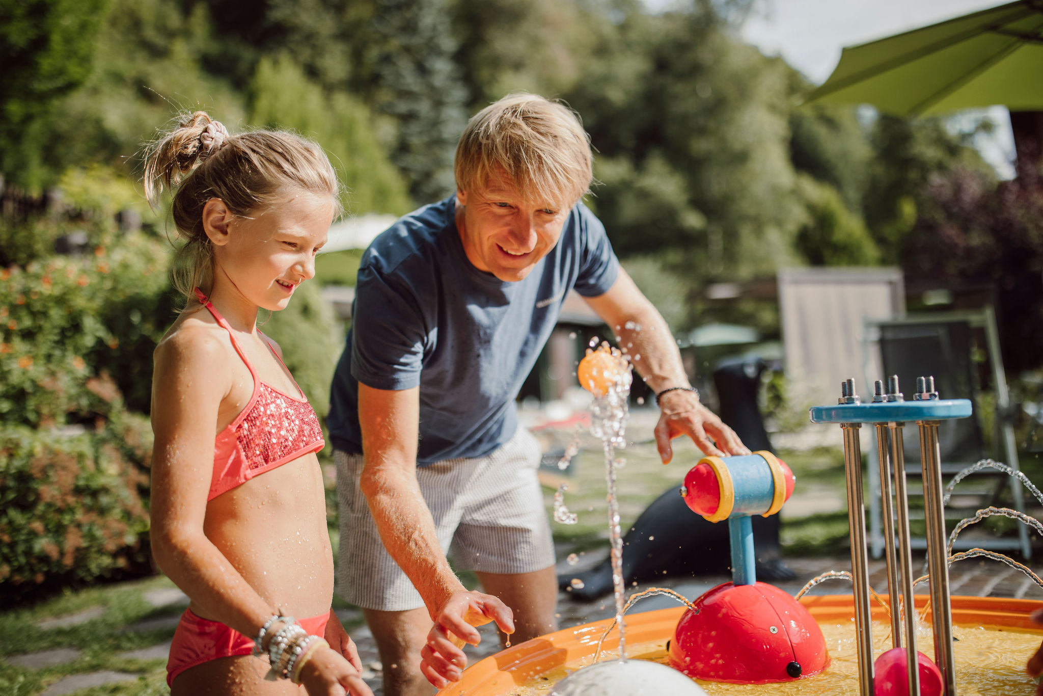 Biohotel: Die Wassespiele im Kleinkinderpool locken auch die Großen - Familien- & Gartenhotel Theresia****S
