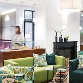 Biohotel: Hotellobby - Boutiquehotel Stadthalle