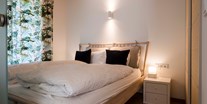 Naturhotel - Hoteltyp: Bio-Ferienwohnung / Ferienhaus - Ihr Schlafzimmer - THE GREEN LODGE 
