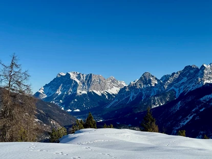 Naturhotel - Ferienwohnungen - Umhausen - Die Zugspitze, wenn im Flachland Nebel liegt... - il nido