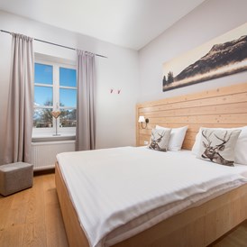 Biohotel: Doppelzimmer der S-Kategorie mit kleinem Schlafbereich - Q! Resort Health & Spa Kitzbühel