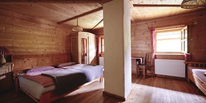 Naturhotel - Bio-Getränke - Ramsau am Dachstein - Schlafzimmer Waldwohnung im Waldhaus - Naturhaus Lehnwieser