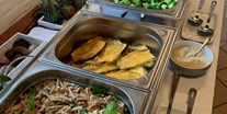 Naturhotel - Bio-Küche: Regionale Speisen - Ausschnitt aus einem Hochzeitskleid-Mehr-Gänge-Buffet - Vegan Resort