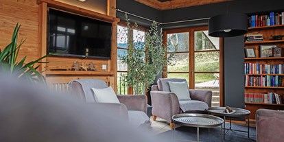 Naturhotel - PLZ 87600 (Deutschland) - Unser neuer Wintergarten – der ideale Platz für gemütliche Stunden mit einem guten Buch und einer Tasse frischen Bio-Kaffee.  - moor&mehr Bio-Kurhotel