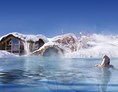 Biohotel: Beheizter Pool der Wasserwelten im Winter - Biohotel Stanglwirt